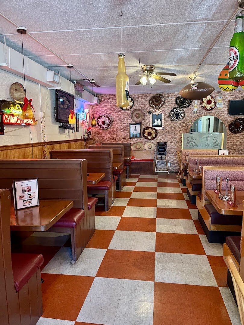 Casual seating inside a seafood and Mexican restaurant.